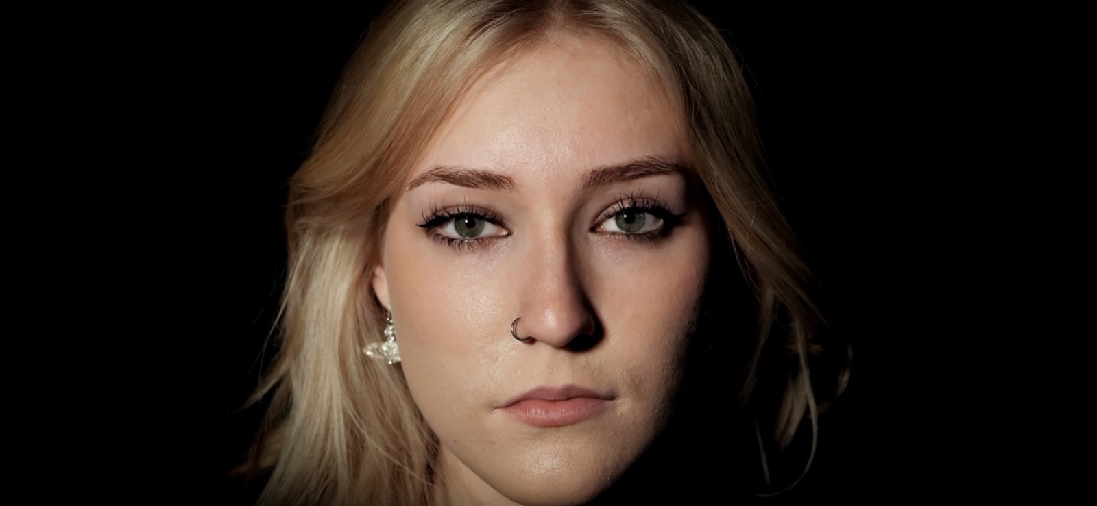 Dramatic close studio headshot created by Next Stages